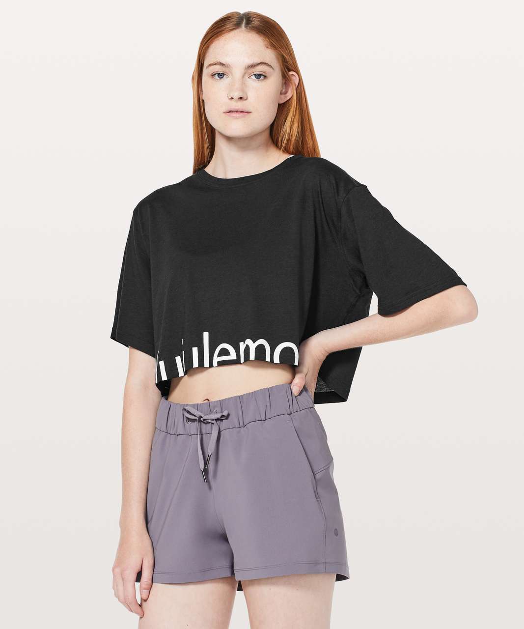 https://storage.googleapis.com/lulu-fanatics/product/40040/1280/lululemon-cortes-crop-tee-expression-black-0001-236533.jpg