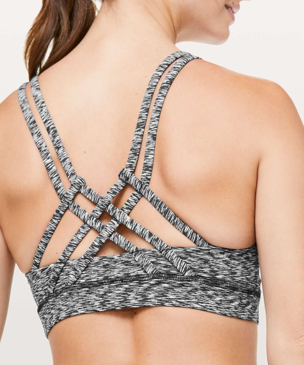 https://storage.googleapis.com/lulu-fanatics/product/42436/1280/lululemon-energy-bra-strapped-spaced-out-space-dye-black-white-035910-247784.jpg