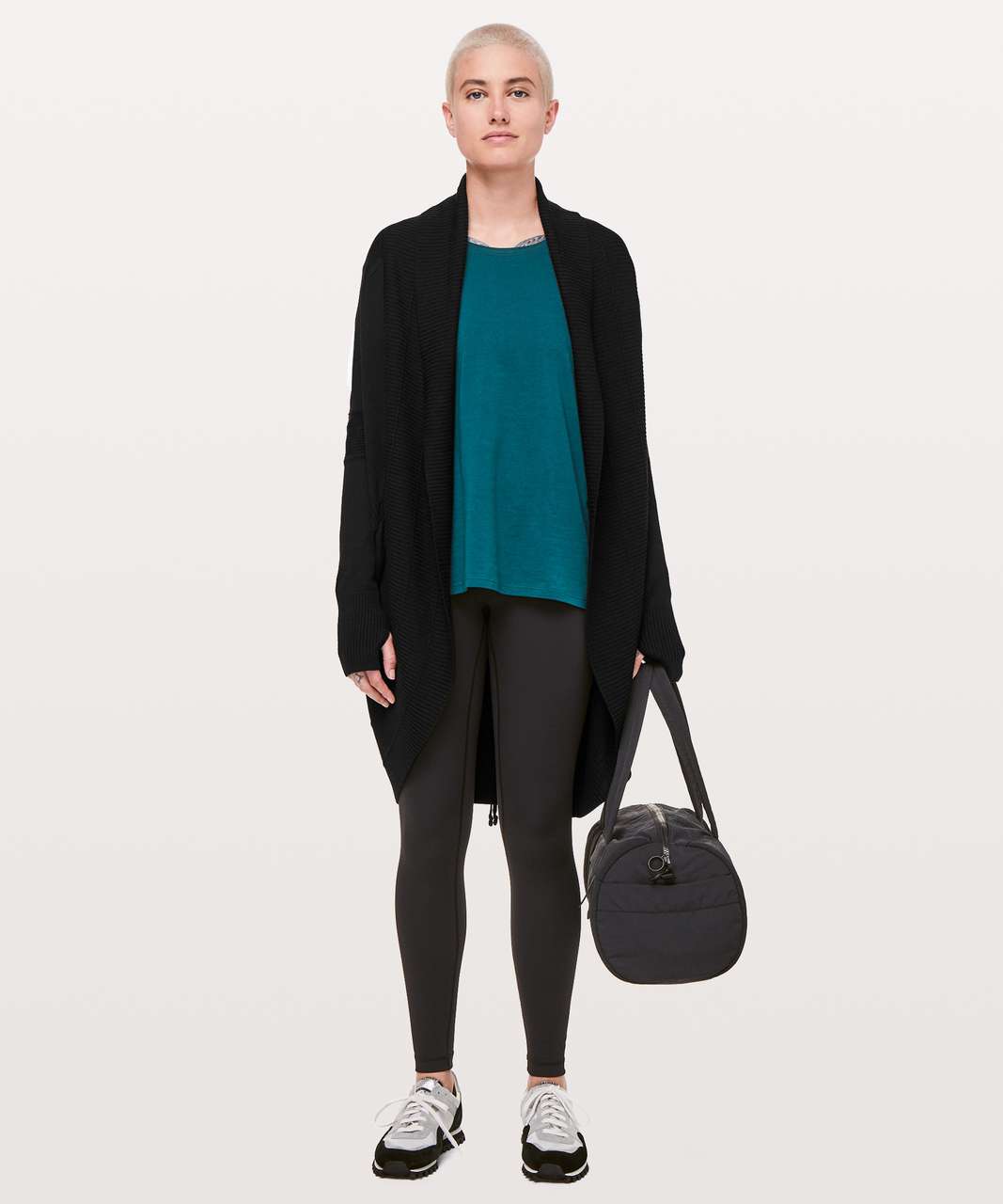 Transformational Sweater from Lululemon. I own this. It's reversible and  has a cinch to change length. Lik…