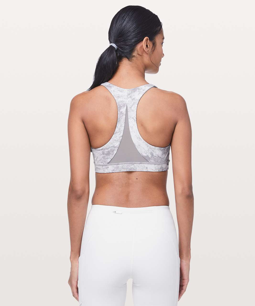 https://storage.googleapis.com/lulu-fanatics/product/45712/1280/lululemon-invigorate-bra-washed-marble-alpine-white-silverscreen-silverscreen-037103-263116.jpg