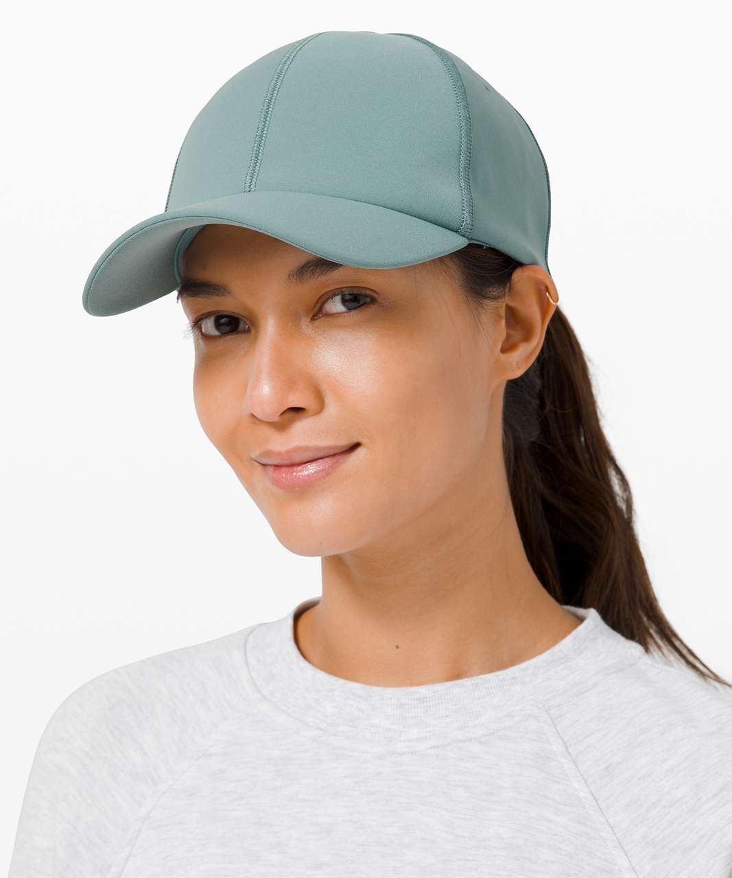 https://storage.googleapis.com/lulu-fanatics/product/53352/1280/lululemon-baller-hat-tidewater-teal-043635-303224.jpg