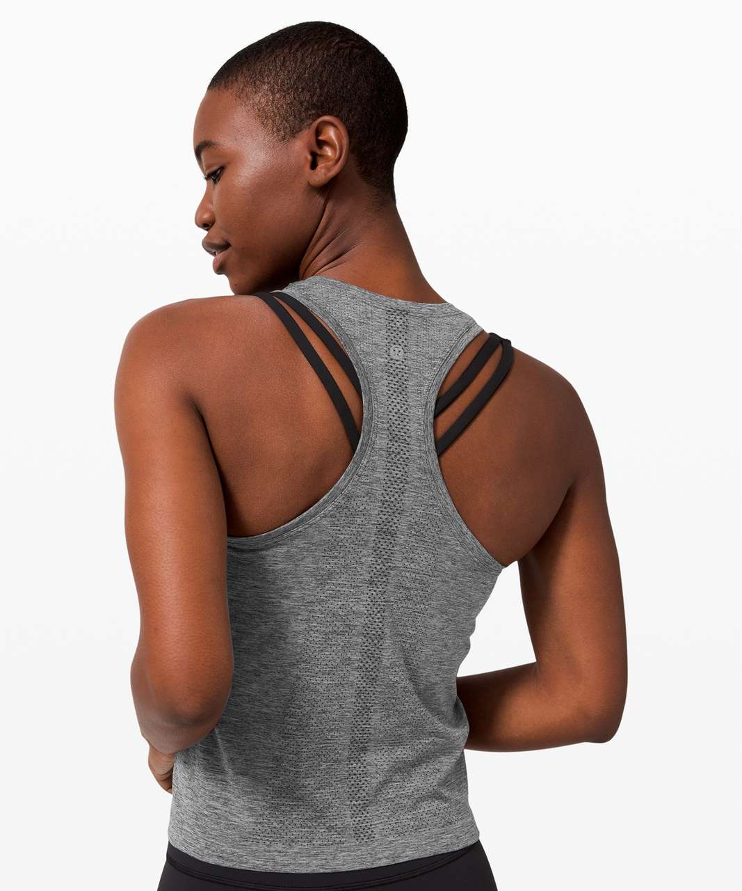 https://storage.googleapis.com/lulu-fanatics/product/55120/1280/lululemon-swiftly-tech-racerback-2-0-race-length-graphite-grey-silver-drop-044452-311899.jpg