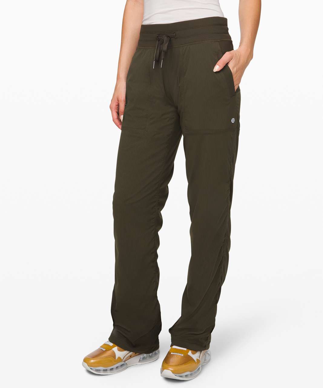 Buy the Lululemon olive green loose fit studio active pants