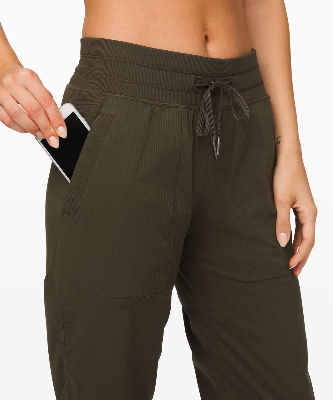 Buy the Lululemon olive green loose fit studio active pants