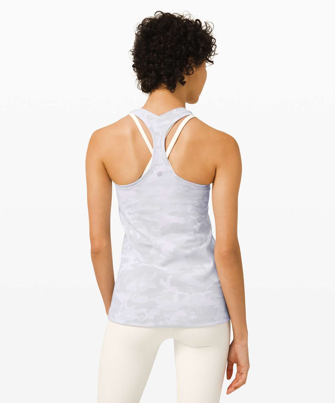 https://storage.googleapis.com/lulu-fanatics/product/56102/1280/lululemon-cool-racerback-luxtreme-incognito-camo-jacquard-alpine-white-starlight-045102-315660.jpg