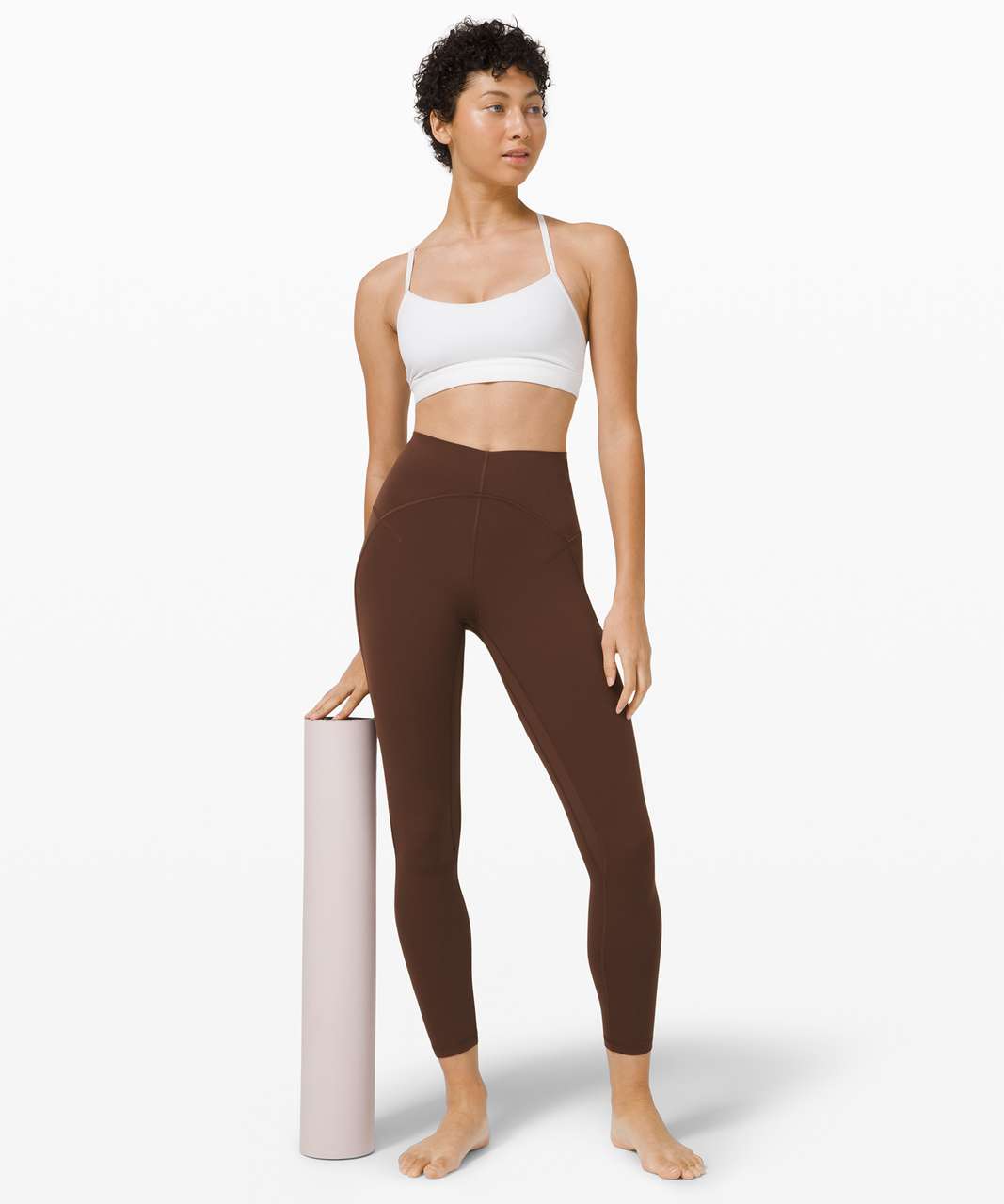 https://storage.googleapis.com/lulu-fanatics/product/56859/1280/lululemon-unlimit-high-rise-tight-25-brown-earth-045604-318643.jpg