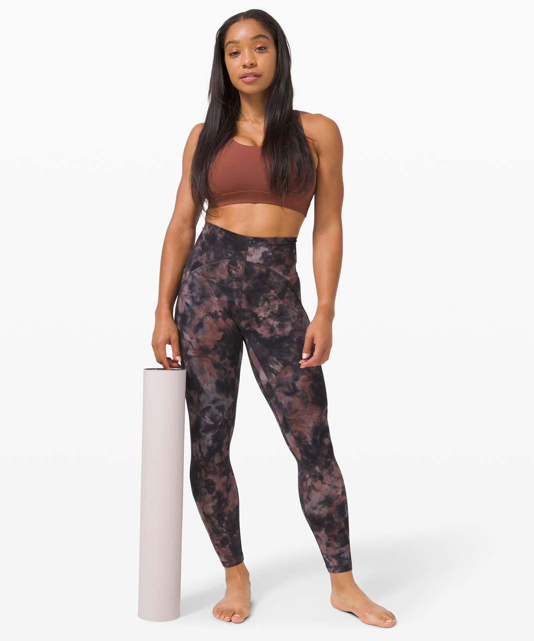 https://storage.googleapis.com/lulu-fanatics/product/57806/1280/lululemon-unlimit-high-rise-tight-25-keyhole-diamond-dye-graphite-grey-pink-pastel-046199-322931.jpg