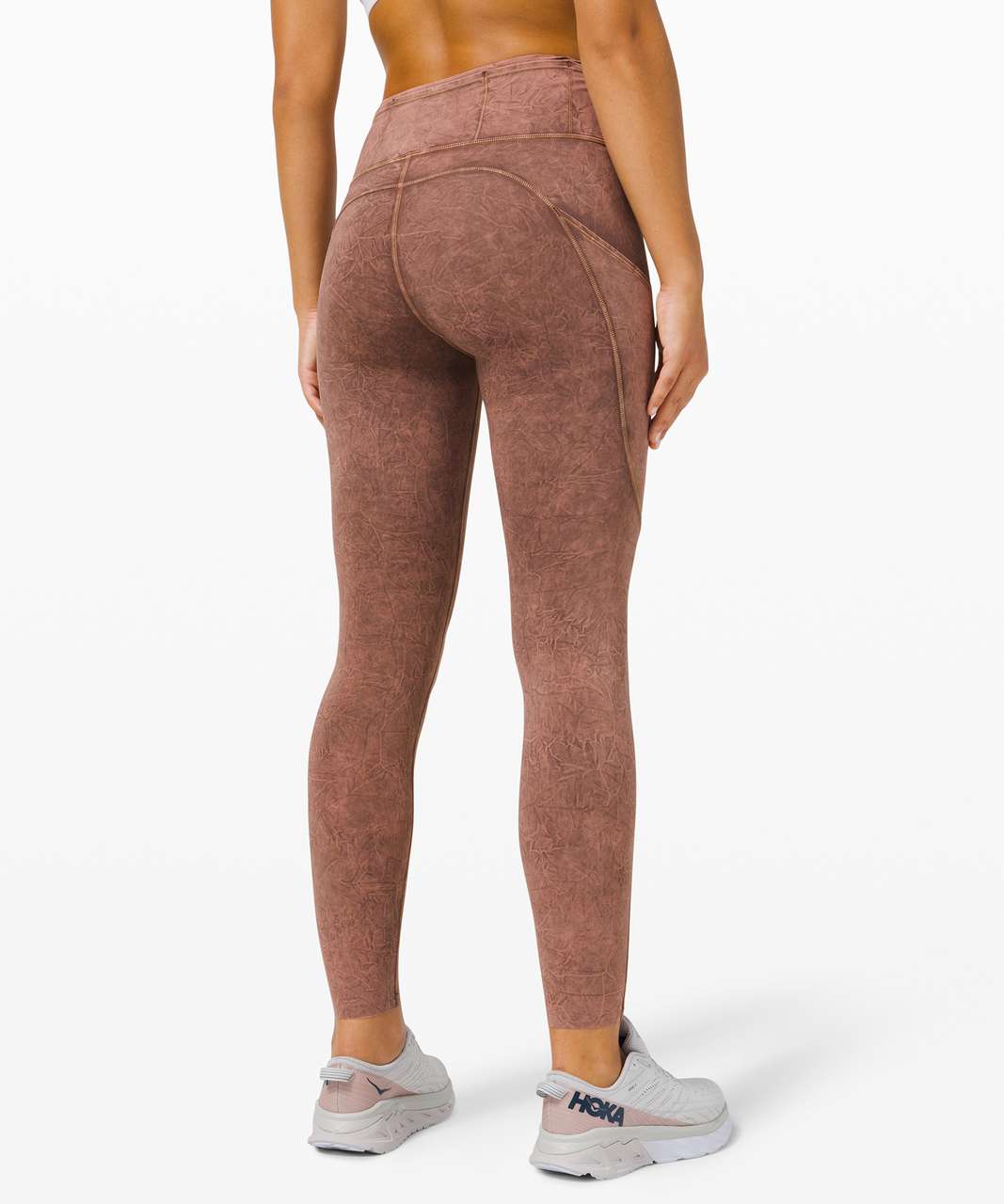 https://storage.googleapis.com/lulu-fanatics/product/59245/1280/lululemon-fast-and-free-tight-ii-25-ice-dye-non-reflective-ice-wash-brown-earth-046549-329628.jpg