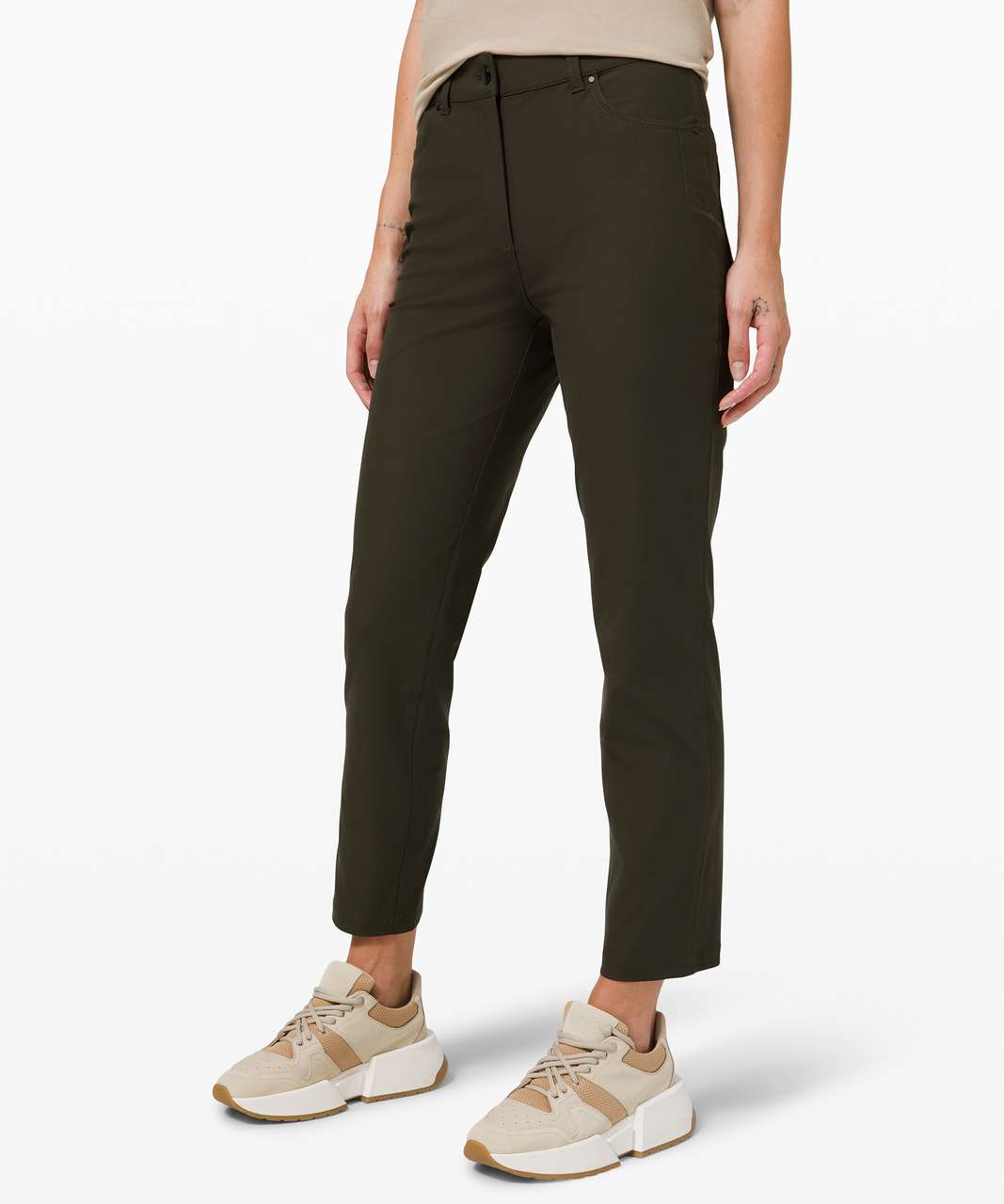 https://storage.googleapis.com/lulu-fanatics/product/59345/1280/lululemon-city-sleek-5-pocket-7-8-pant-dark-olive-026083-330136.jpg