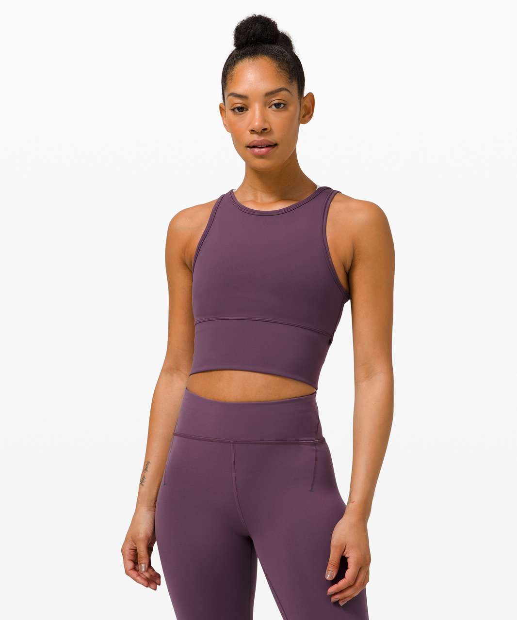 https://storage.googleapis.com/lulu-fanatics/product/61770/1280/lululemon-power-pivot-tank-everlux-grape-thistle-047821-341579.jpg