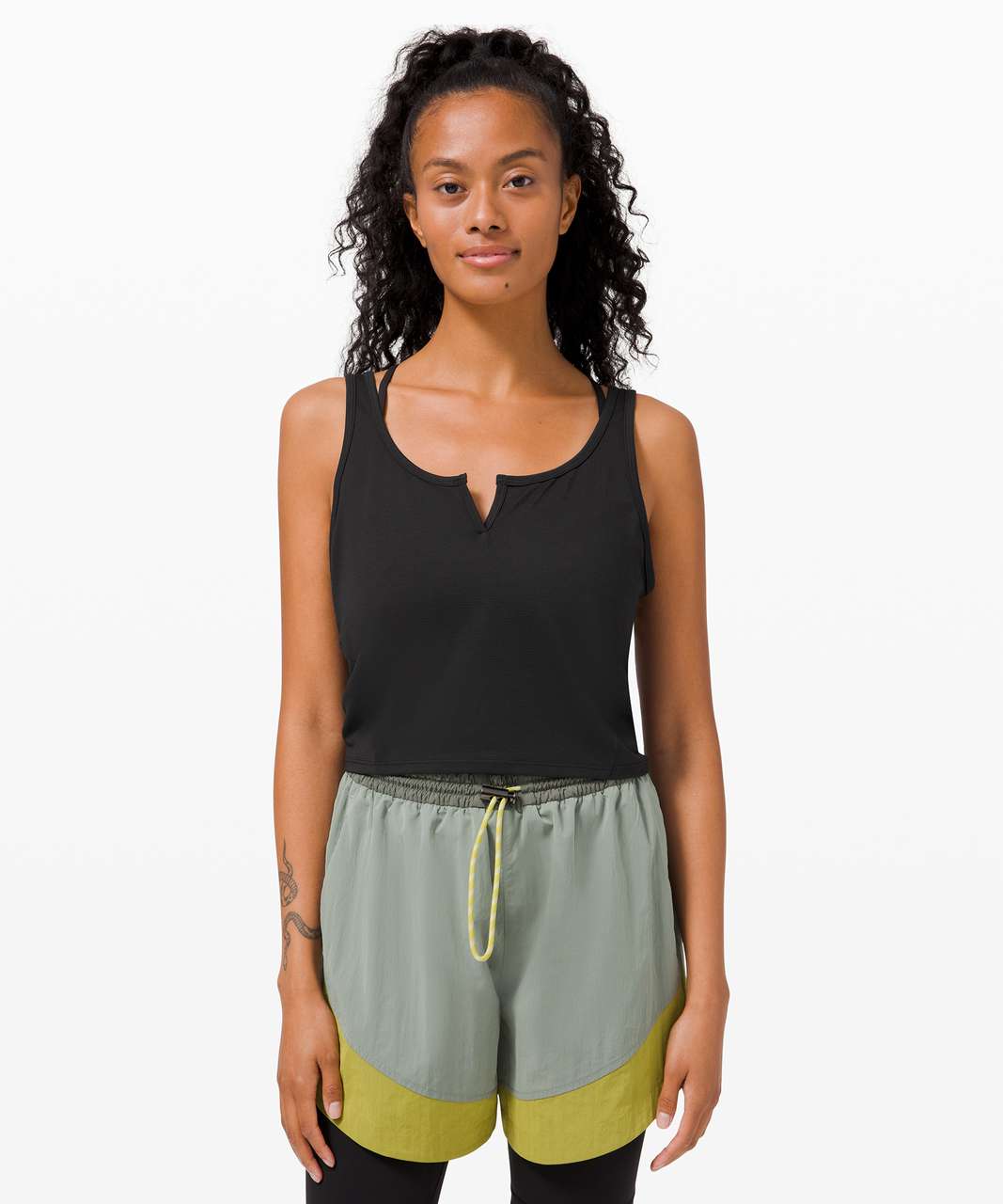 https://storage.googleapis.com/lulu-fanatics/product/62251/1280/lululemon-cropped-henley-tank-top-black-0001-343817.jpg