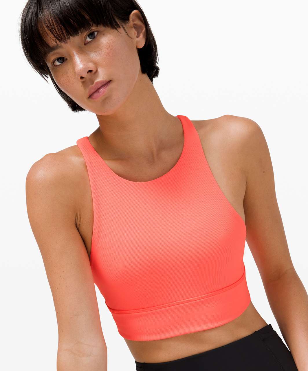 https://storage.googleapis.com/lulu-fanatics/product/62977/1280/lululemon-energy-bra-high-neck-long-line-rib-medium-support-b-d-cup-sunset-032324-347171.jpg