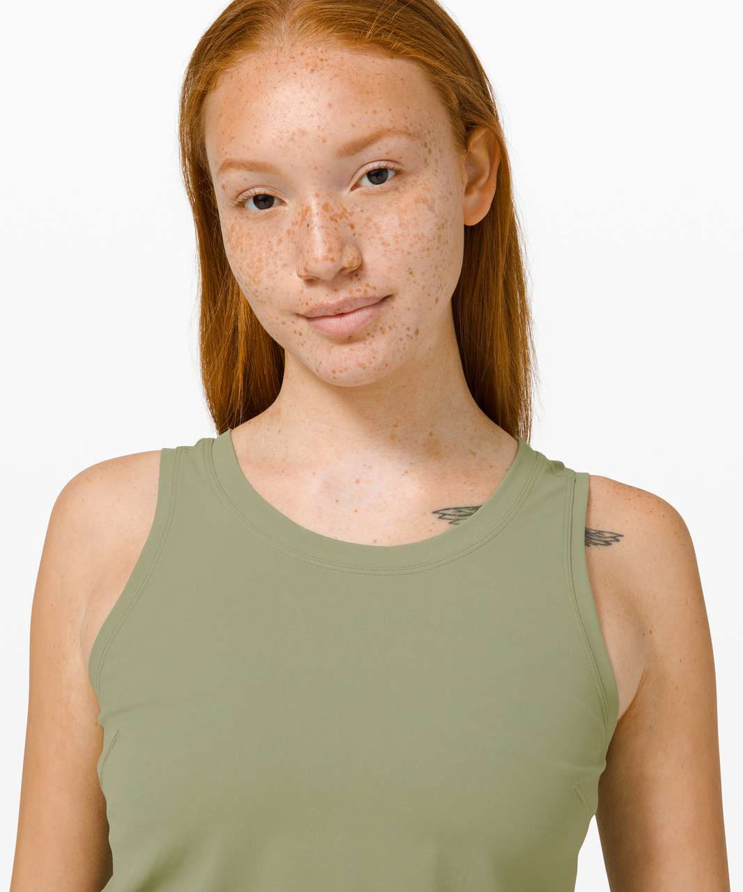 https://storage.googleapis.com/lulu-fanatics/product/63287/1280/lululemon-nulu-fold-classic-fit-yoga-tank-top-rosemary-green-047797-348661.jpg