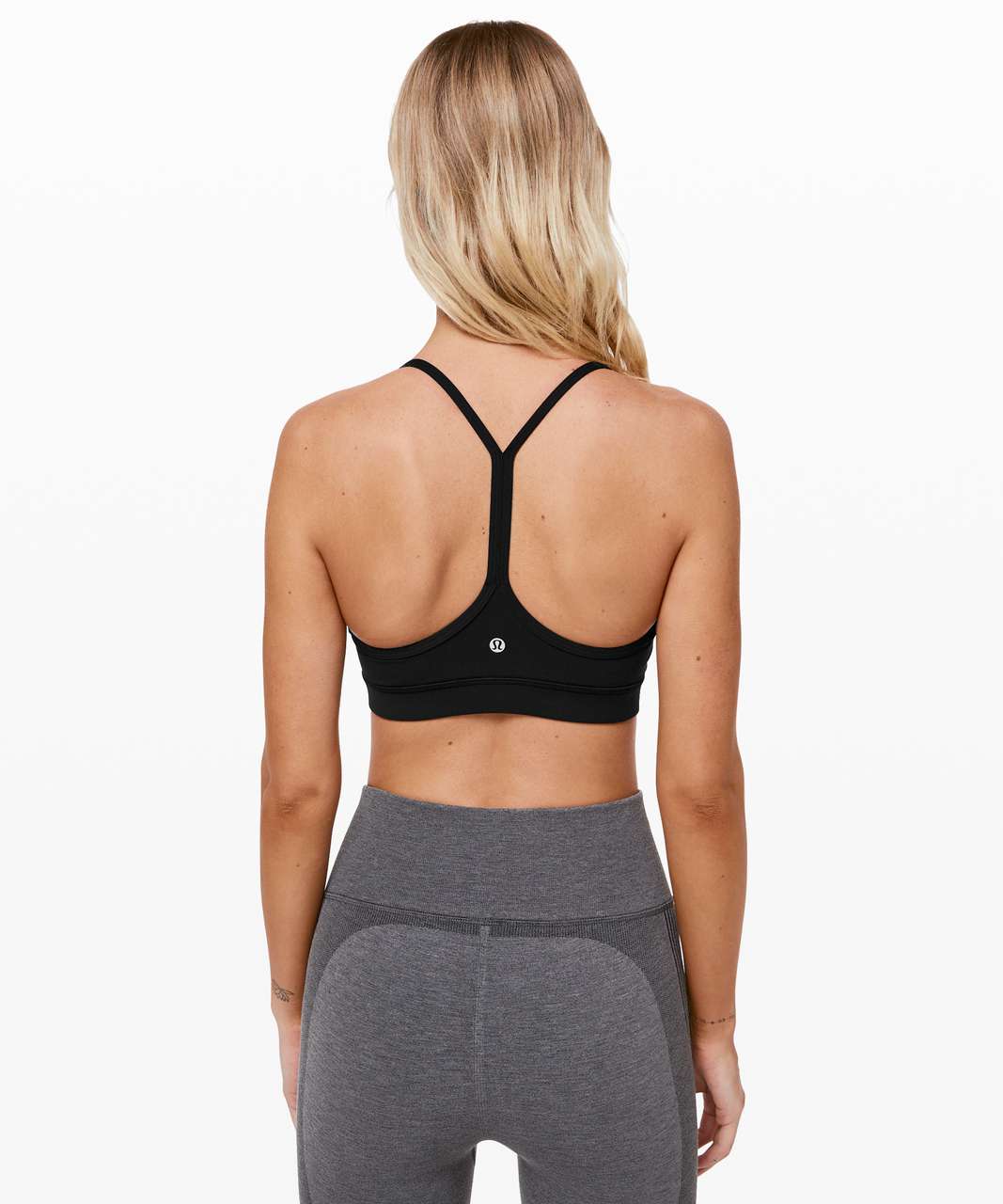 https://storage.googleapis.com/lulu-fanatics/product/63499/1280/lululemon-flow-y-bra-nulu-light-support-a-c-cups-black-0001-349678.jpg