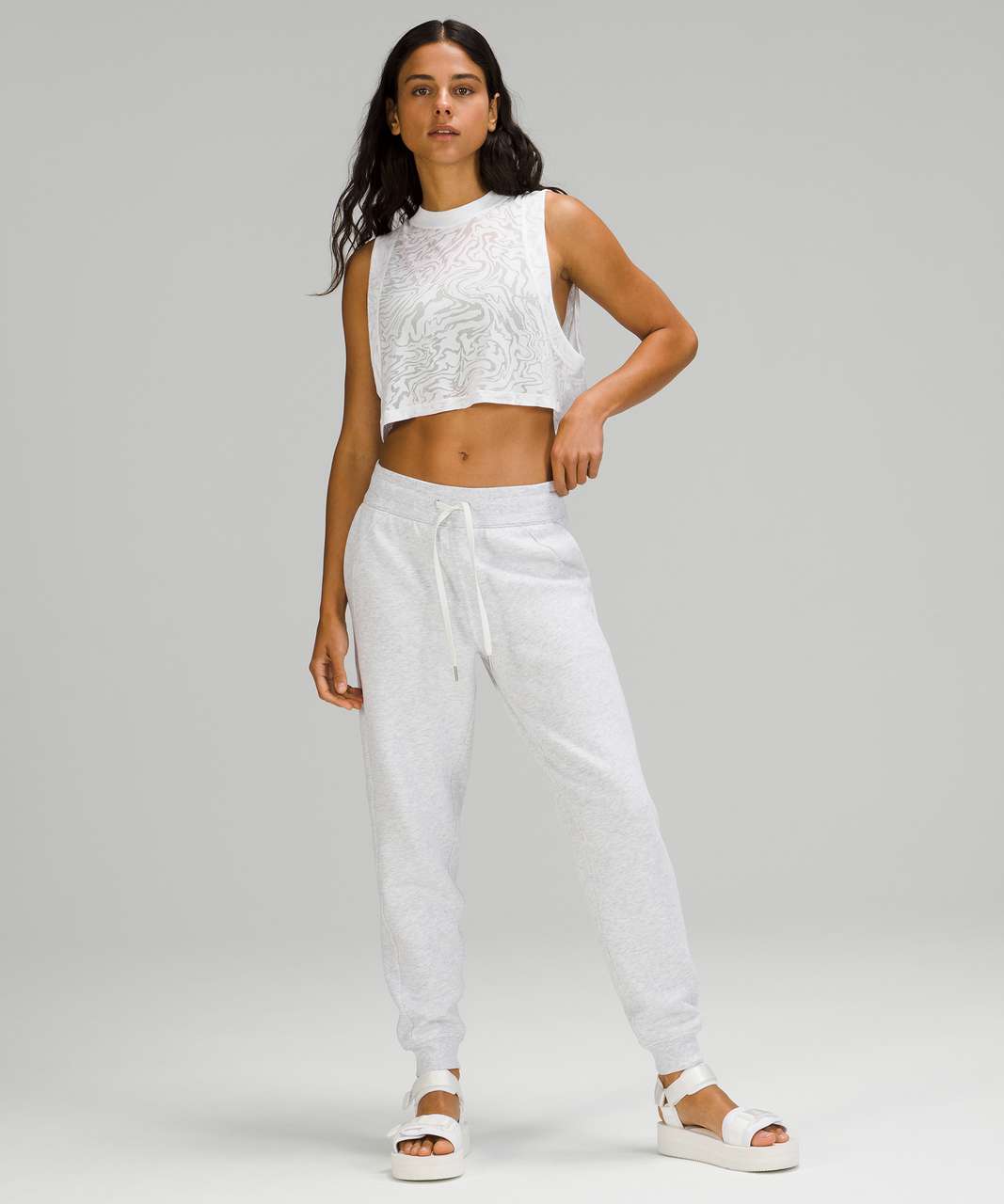 https://storage.googleapis.com/lulu-fanatics/product/63746/1280/lululemon-all-yours-crop-tank-top-veil-white-0002-350827.jpg