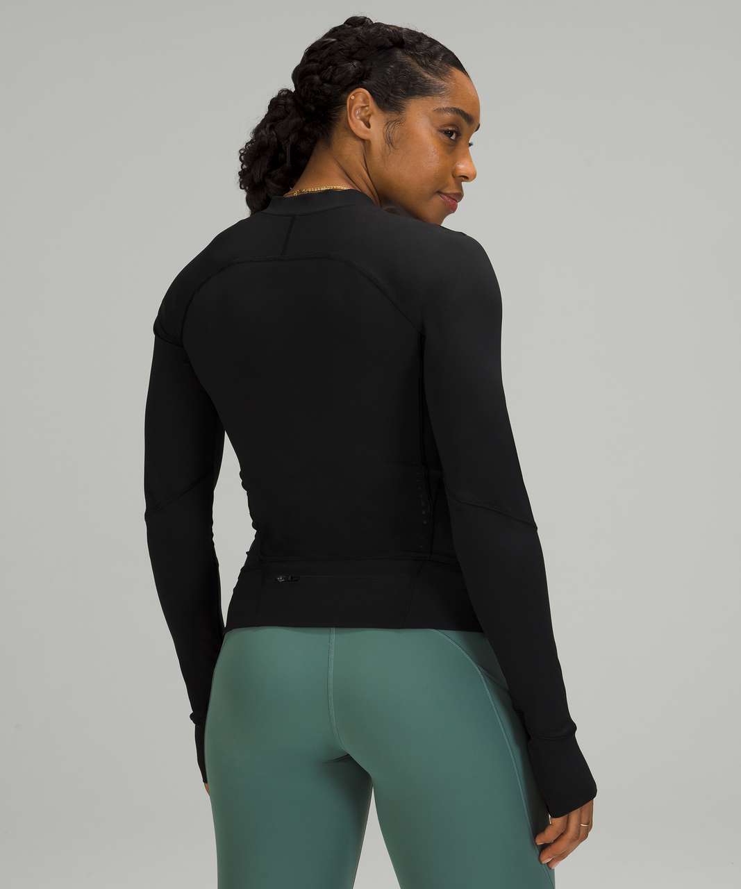 wearing nulux UVP run jacket in delicate mint (4), nulux racerback