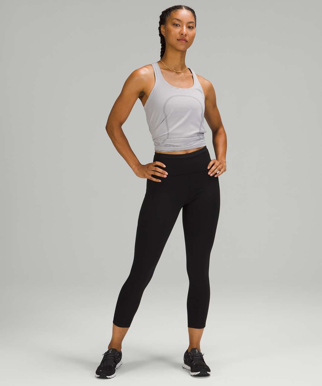 https://storage.googleapis.com/lulu-fanatics/product/63806/1280/lululemon-swift-speed-high-rise-crop-23-black-0001-351116.jpg