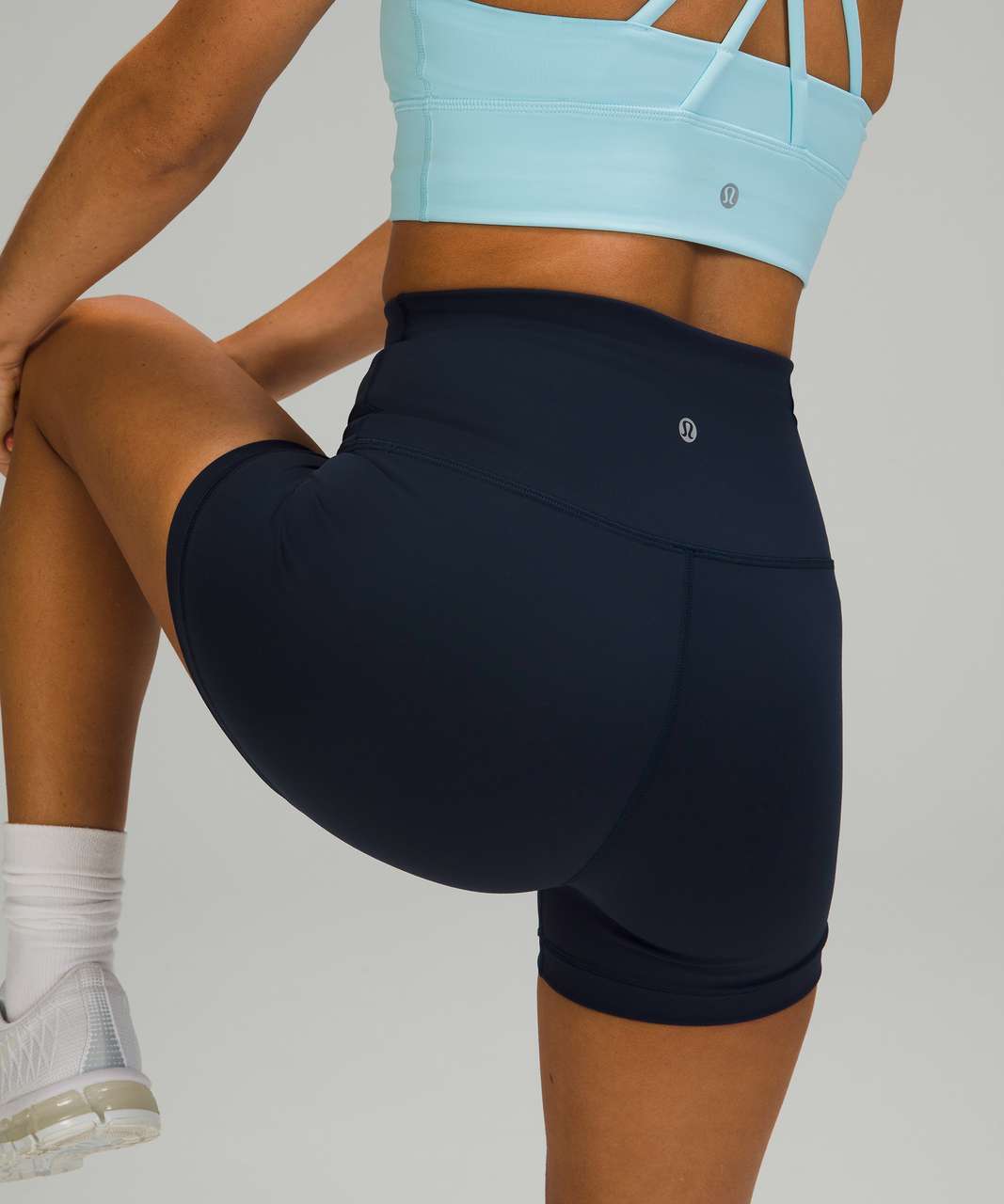 https://storage.googleapis.com/lulu-fanatics/product/63830/1280/lululemon-wunder-train-high-rise-short-4-true-navy-031382-351232.jpg