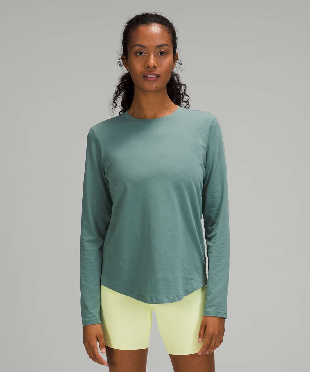 https://storage.googleapis.com/lulu-fanatics/product/63995/1280/lululemon-love-long-sleeve-tidewater-teal-043635-351987.jpg