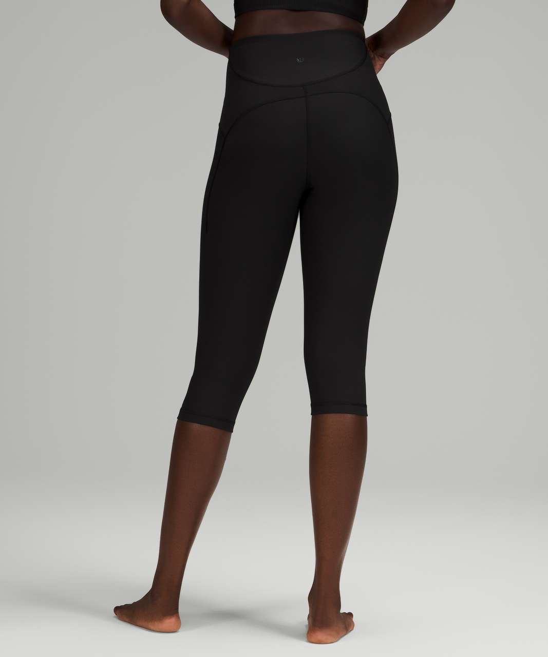 Lululemon Solid Black Crop Legging with Side Pockets and Ribbed