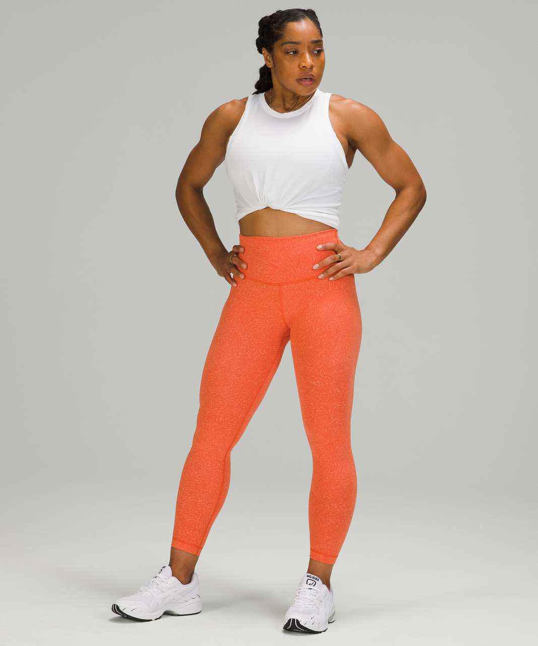 https://storage.googleapis.com/lulu-fanatics/product/64157/1280/lululemon-wunder-train-high-rise-tight-25-crunch-warm-coral-049643-352668.jpg