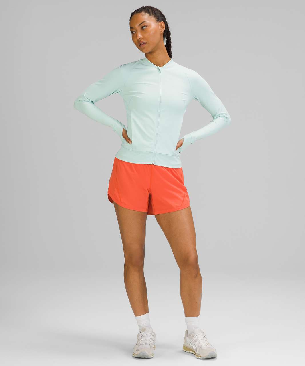 wearing nulux UVP run jacket in delicate mint (4), nulux racerback