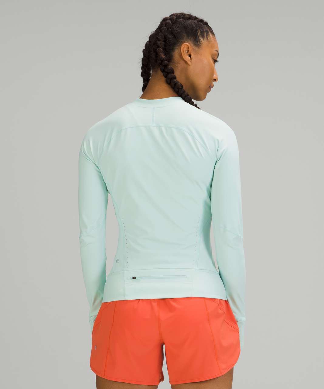 wearing nulux UVP run jacket in delicate mint (4), nulux racerback