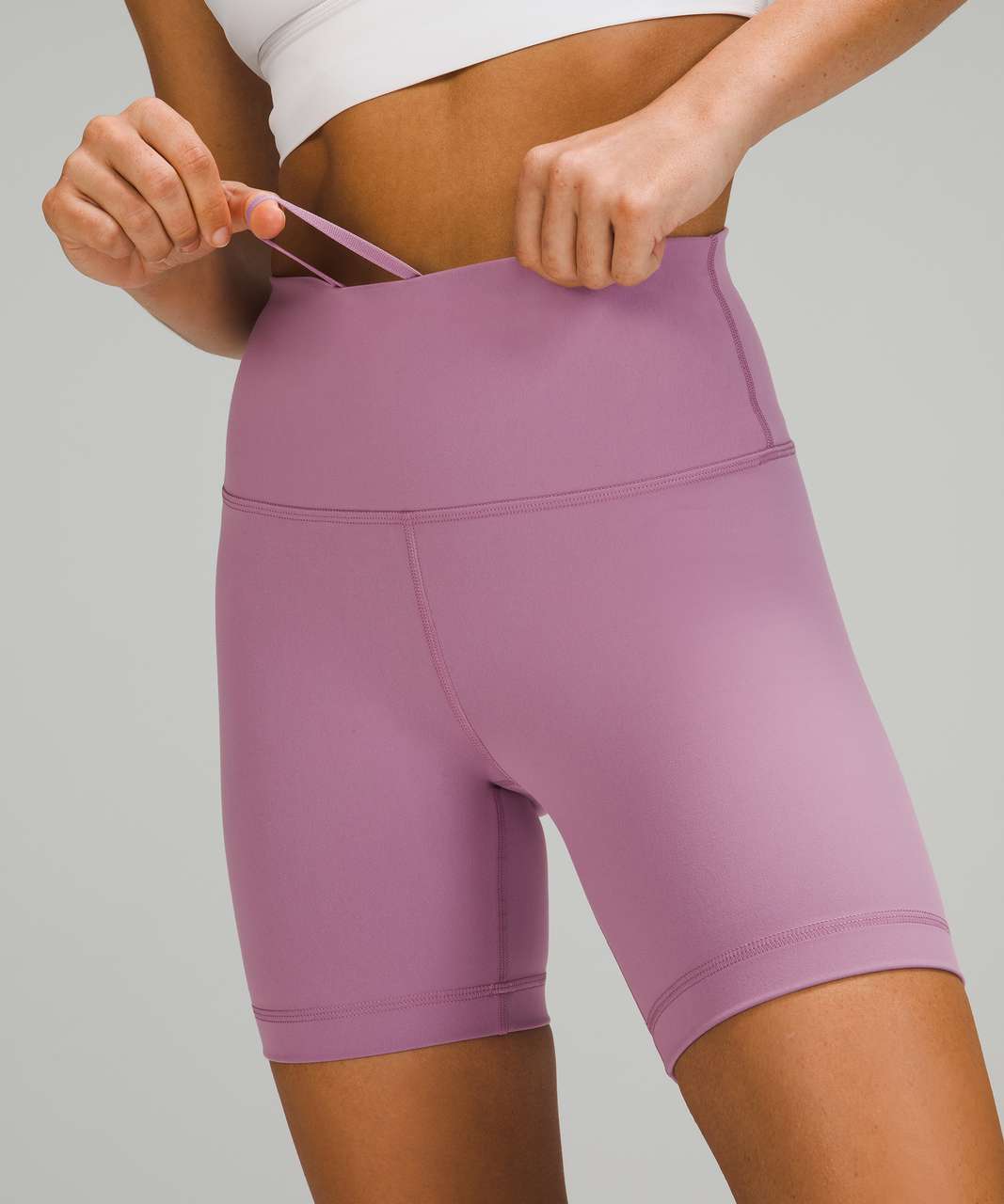 https://storage.googleapis.com/lulu-fanatics/product/65254/1280/lululemon-wunder-train-high-rise-short-6-jubilee-038467-357298.jpg