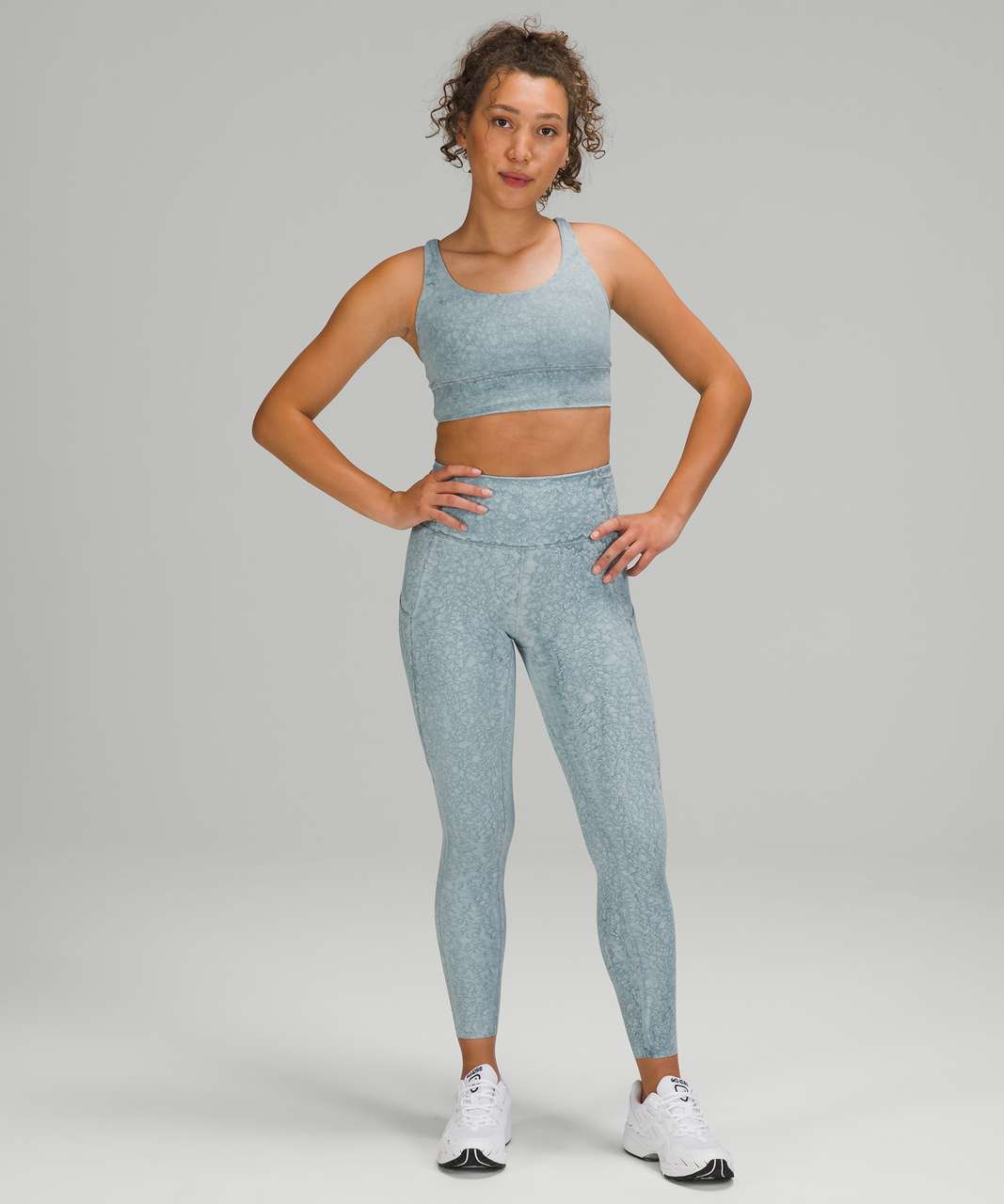 https://storage.googleapis.com/lulu-fanatics/product/65365/1280/lululemon-energy-bra-long-line-medium-support-b-d-cup-city-grit-white-blue-fog-048803-357751.jpg