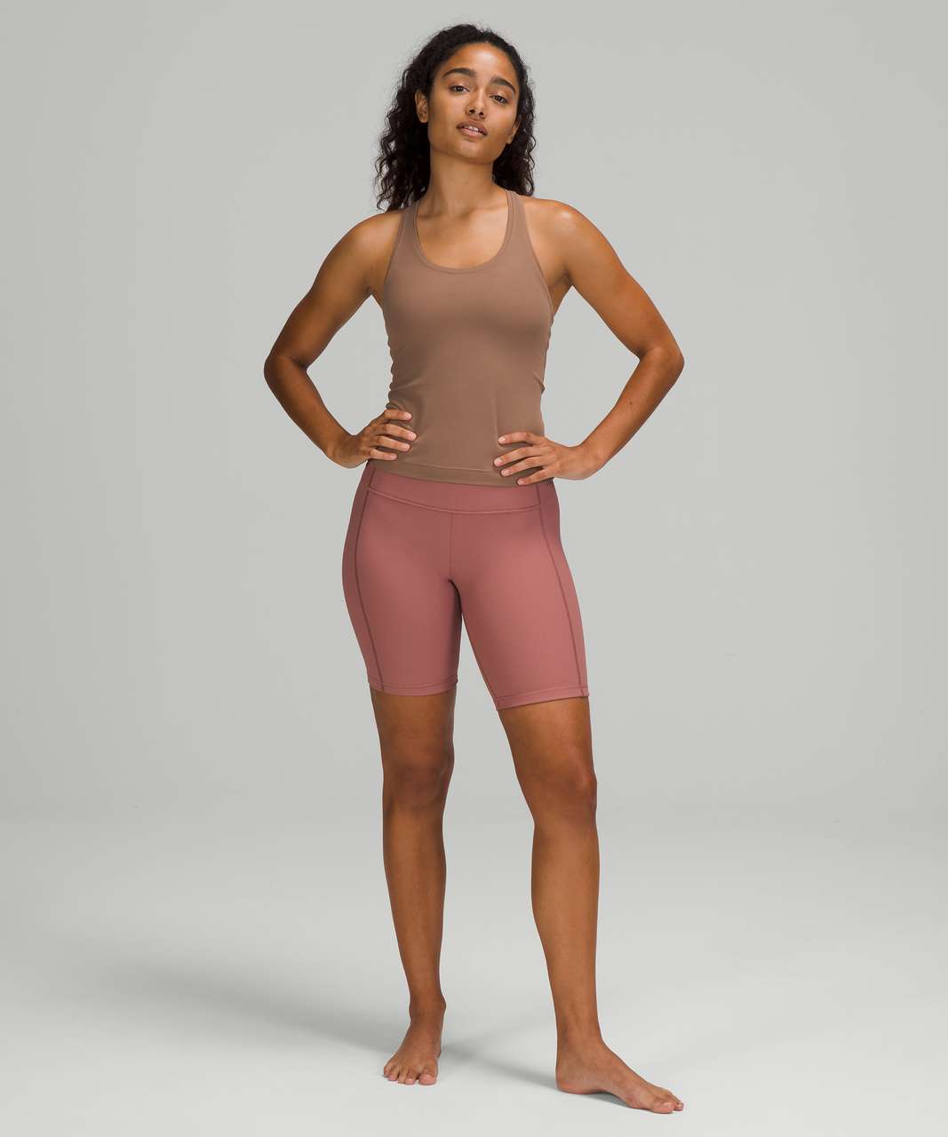 https://storage.googleapis.com/lulu-fanatics/product/65544/1280/lululemon-cool-racerback-tank-top-shorter-length-cacao-048045-358476.jpg