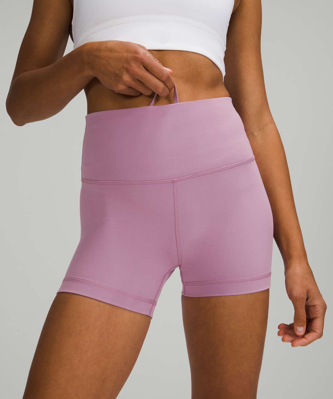 New wunder train biker shorts 6” size 4 in sonic pink!!! And align