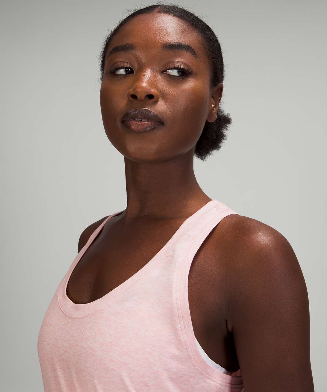 https://storage.googleapis.com/lulu-fanatics/product/65732/1280/lululemon-love-tank-top-heathered-pink-puff-049699-359276.jpg