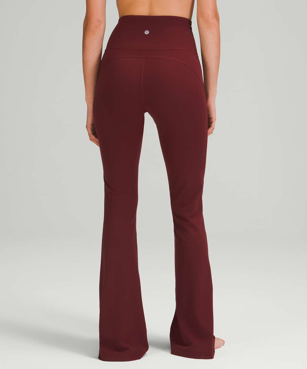 https://storage.googleapis.com/lulu-fanatics/product/65830/1280/lululemon-groove-pant-flare-super-high-rise-nulu-red-merlot-047809-359721.jpg