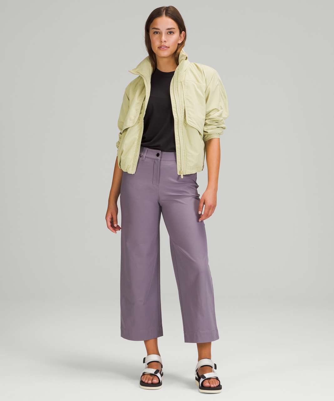 https://storage.googleapis.com/lulu-fanatics/product/65863/1280/lululemon-city-sleek-5-pocket-wide-leg-high-rise-7-8-length-pant-dusky-lavender-030925-359881.jpg