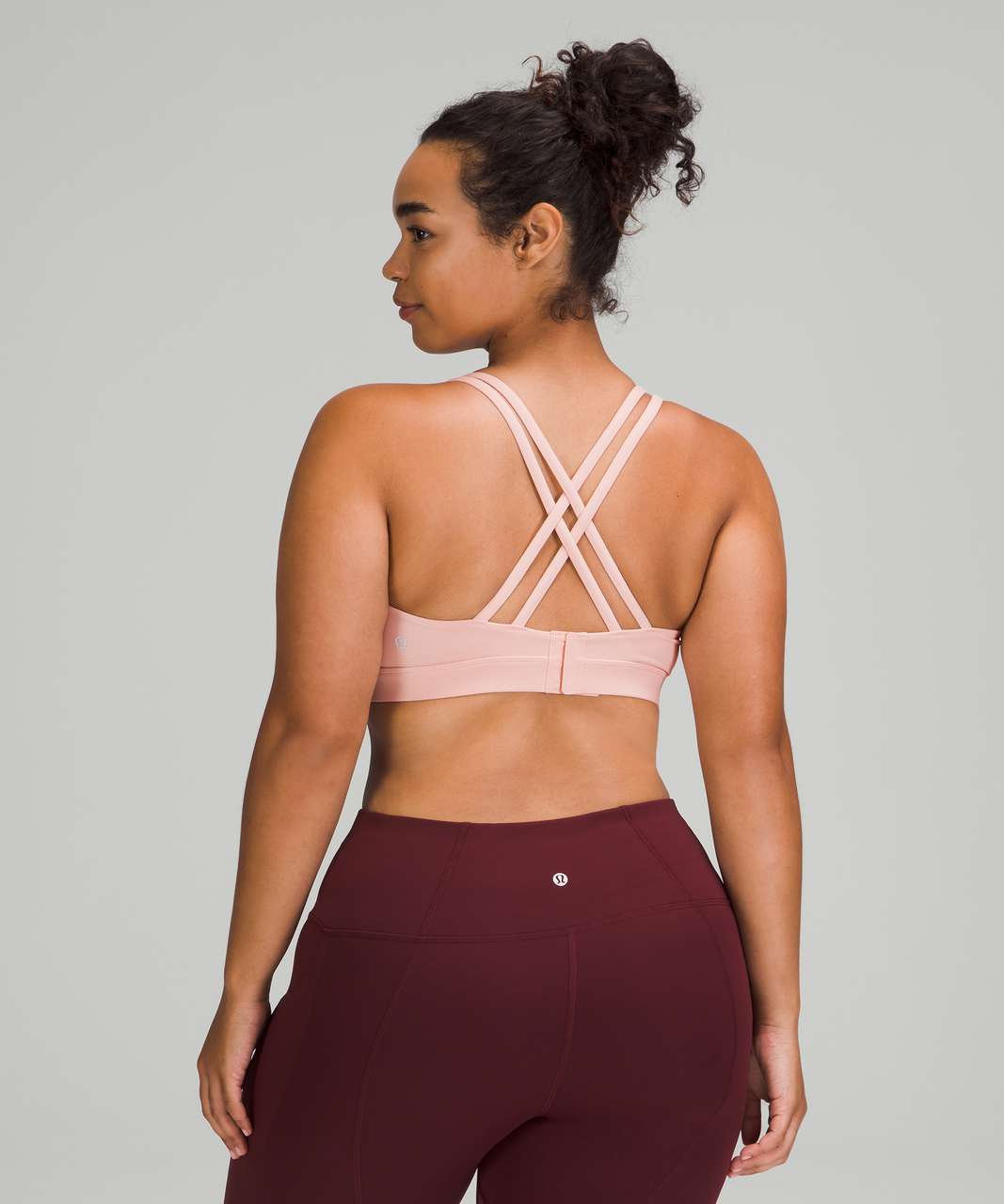 https://storage.googleapis.com/lulu-fanatics/product/66184/1280/lululemon-energy-bra-adjustable-medium-support-b-d-cups-pink-mist-8313-361294.jpg