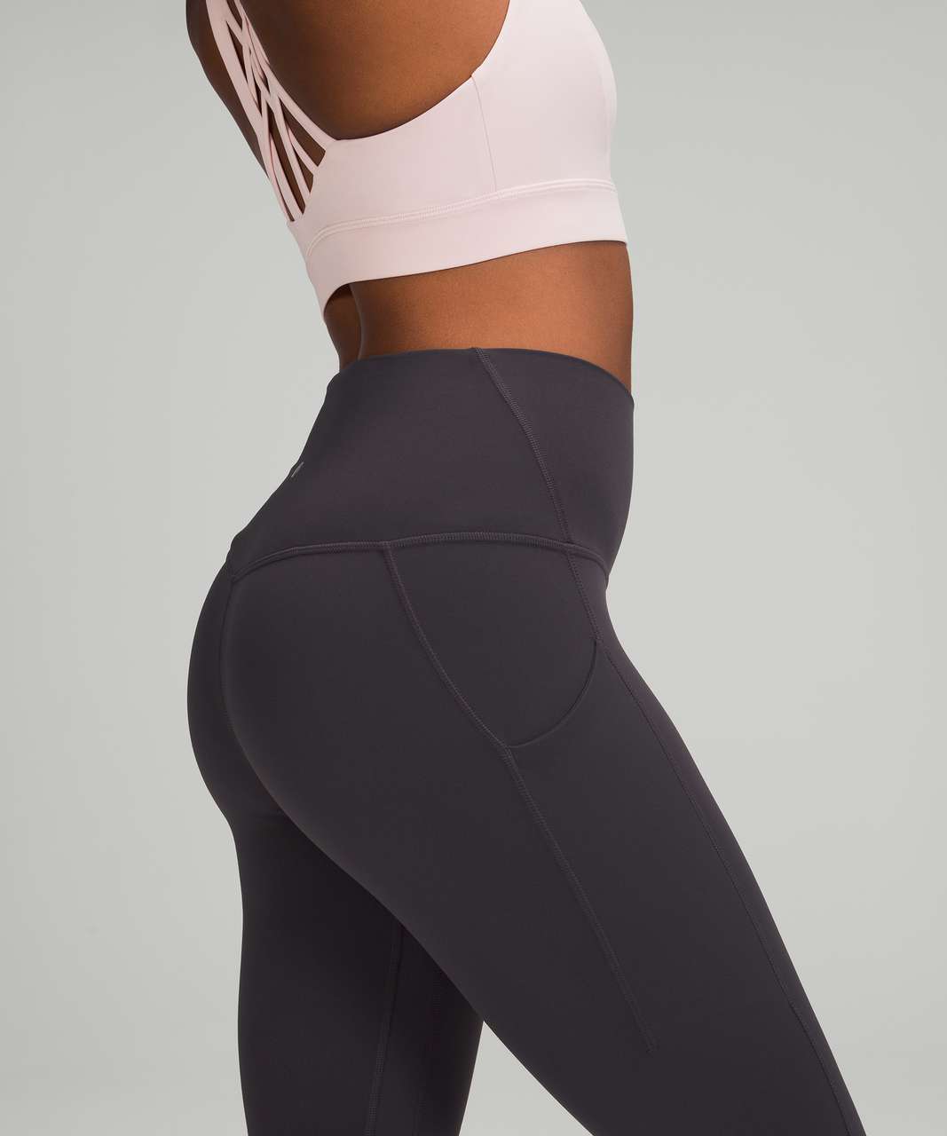 Black Lululemon Leggings with Side Pockets - The Revury