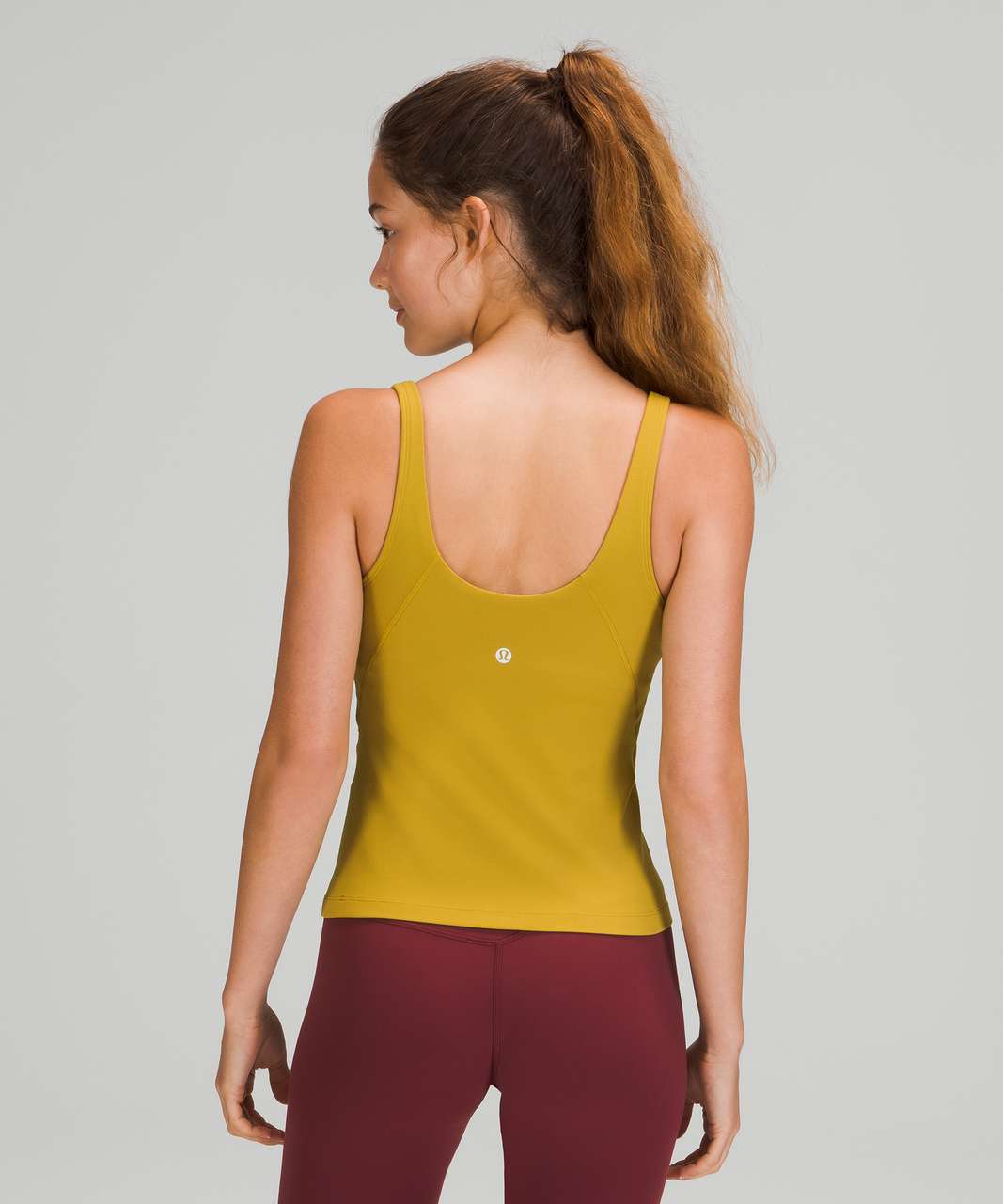 NWT Lululemon Women's Nulu Twist Back Yoga Tank Color Auric Gold