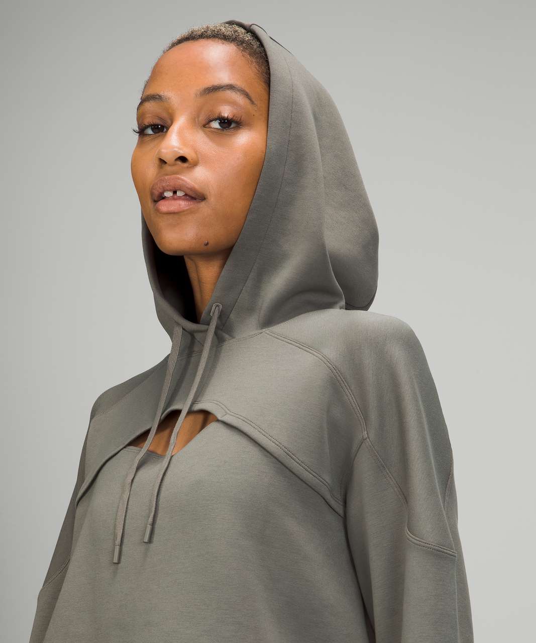 Get centred hoodie size 8 grey sage! The arms are the perfect length and it  is still cropped on me. I'm 5'7”, 160-170 lbs, I think the size smaller  wouldn't have worked