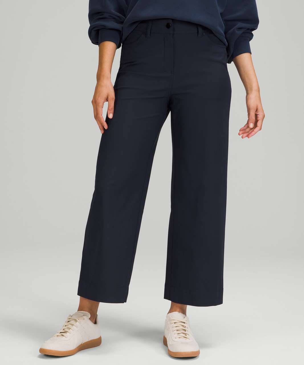 https://storage.googleapis.com/lulu-fanatics/product/66685/1280/lululemon-city-sleek-5-pocket-wide-leg-high-rise-7-8-length-pant-true-navy-031382-363691.jpg