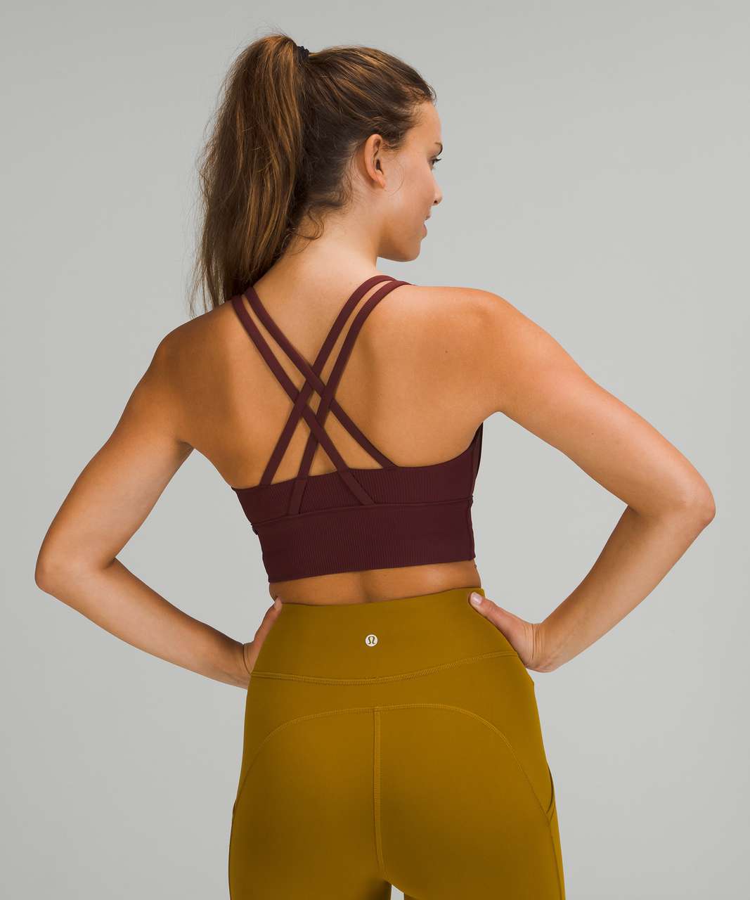 https://storage.googleapis.com/lulu-fanatics/product/66909/1280/lululemon-energy-bra-longline-ribbed-medium-support-b-d-cups-red-merlot-047809-364700.jpg