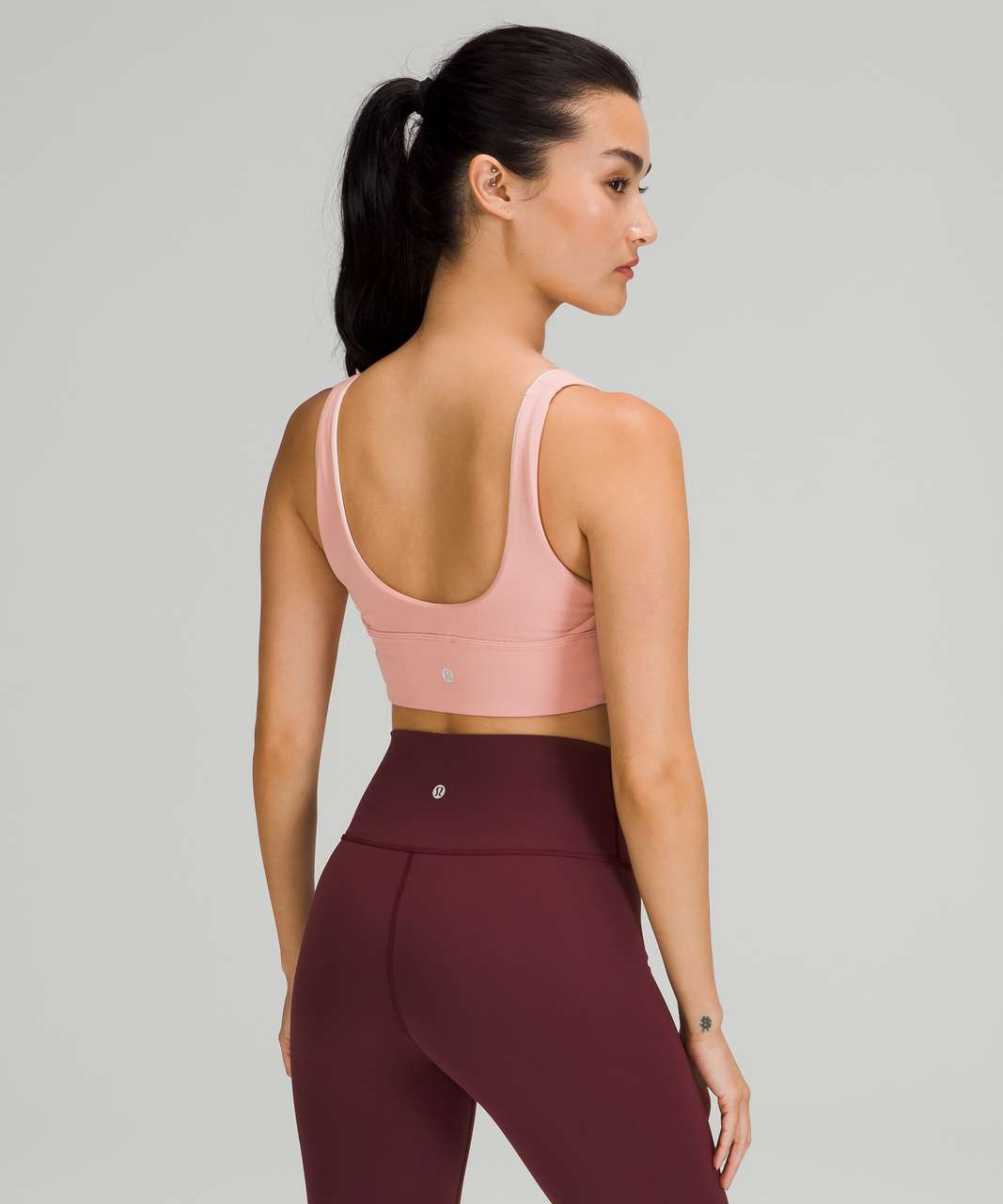 https://storage.googleapis.com/lulu-fanatics/product/67085/1280/lululemon-lululemon-align-reversible-bra-light-support-a-b-cup-pink-puff-pink-mist-051160-365397.jpg