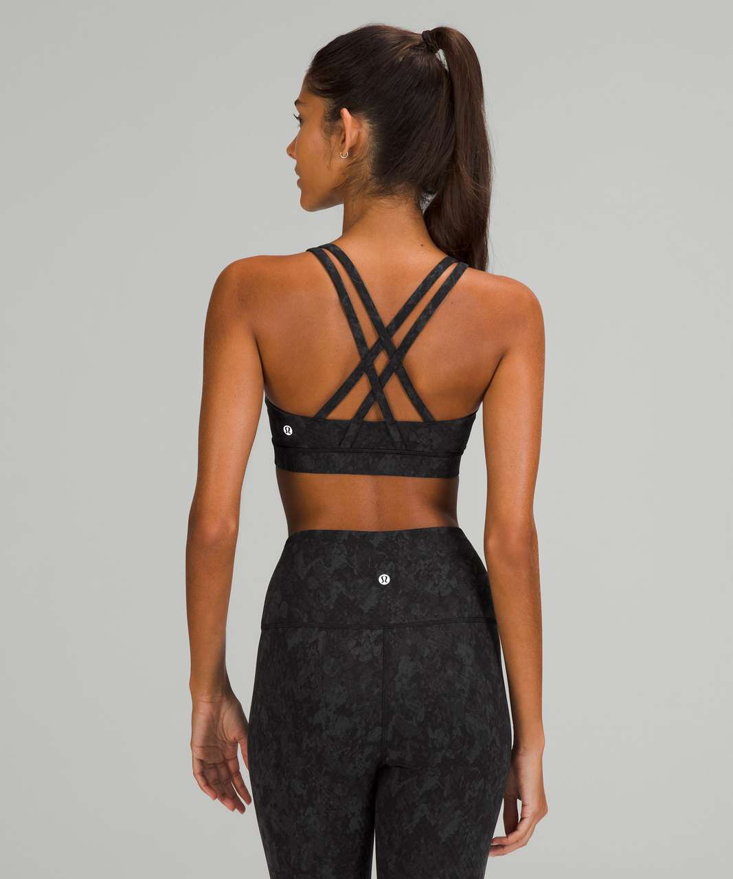 https://storage.googleapis.com/lulu-fanatics/product/67266/1280/lululemon-energy-bra-medium-support-b-d-cups-hideaway-camo-deep-coal-multi-052618-366163.jpg