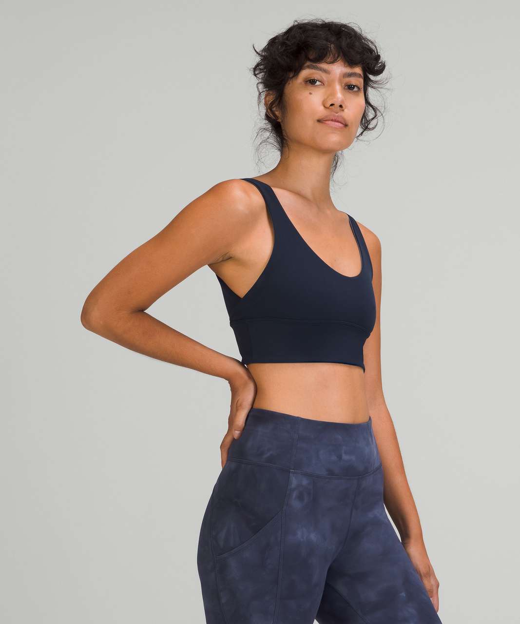 https://storage.googleapis.com/lulu-fanatics/product/67583/1280/lululemon-lululemon-align-reversible-bra-light-support-a-b-cup-true-navy-iron-blue-046597-367588.jpg