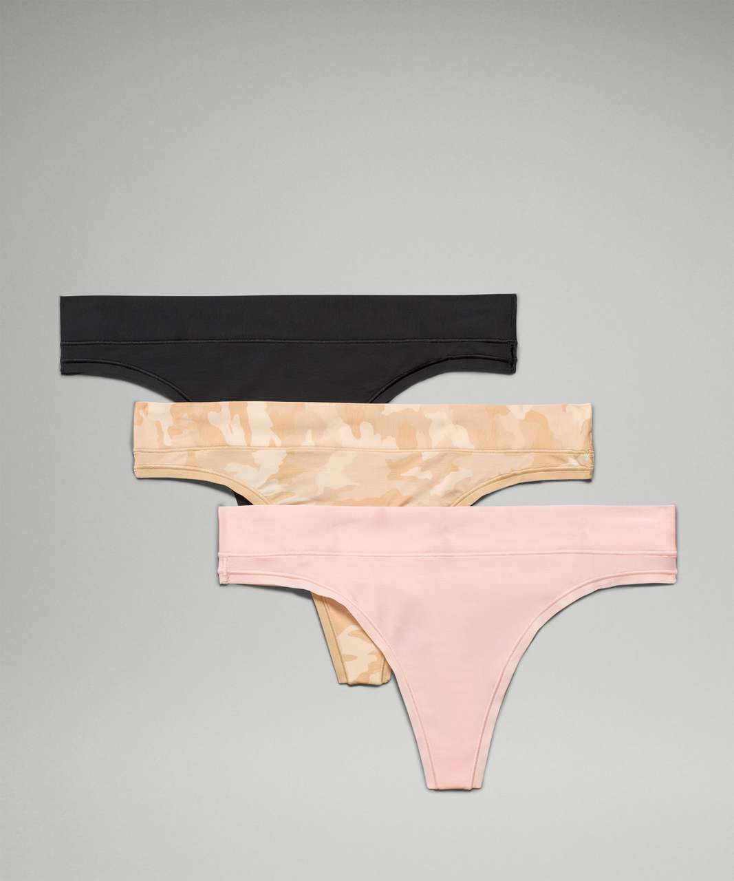 Lululemon UnderEase Mid Rise Thong Underwear 3 Pack - Heritage 365 Camo  Mini Pecan Tan Multi / Pink Mist / Black - lulu fanatics