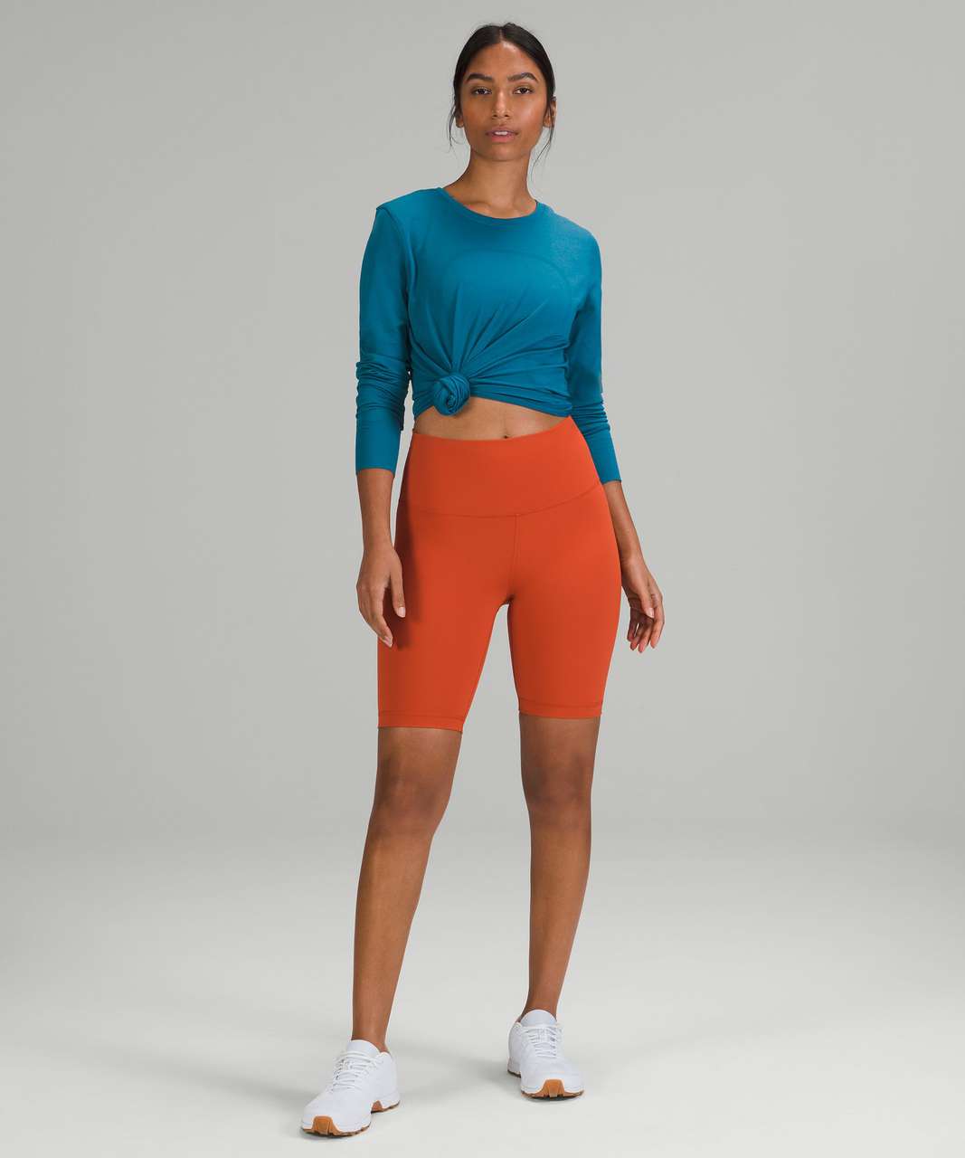 https://storage.googleapis.com/lulu-fanatics/product/68357/1280/lululemon-wunder-train-high-rise-short-8-canyon-orange-048037-371273.jpg