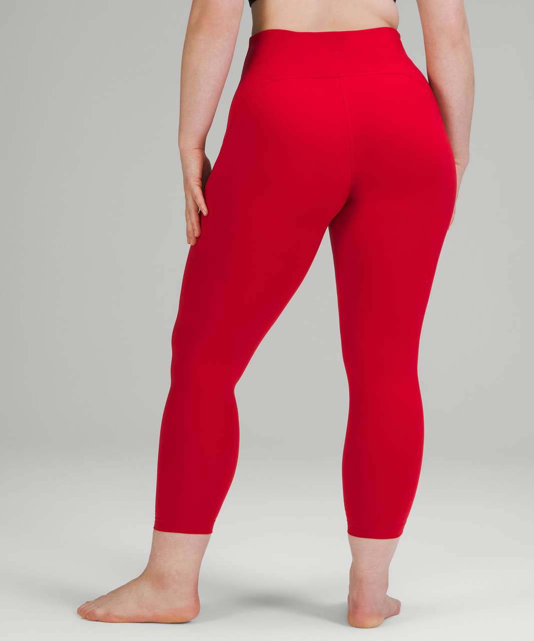 https://storage.googleapis.com/lulu-fanatics/product/68494/1280/lululemon-instill-high-rise-tight-25-dark-red-028948-371937.jpg