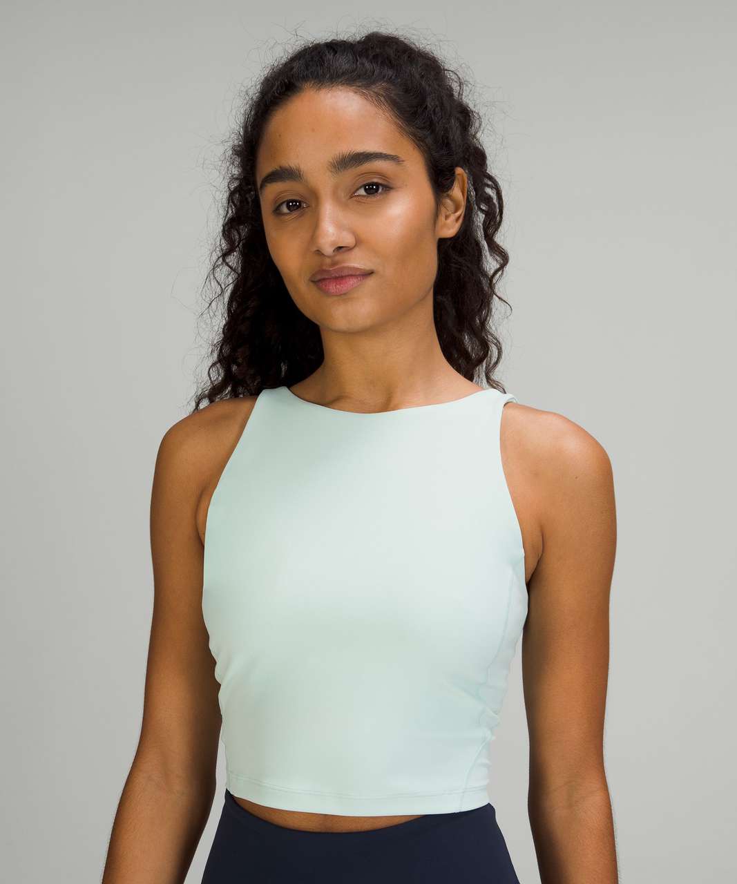 https://storage.googleapis.com/lulu-fanatics/product/69171/1280/lululemon-lululemon-align-high-neck-tank-top-delicate-mint-046741-374437.jpg