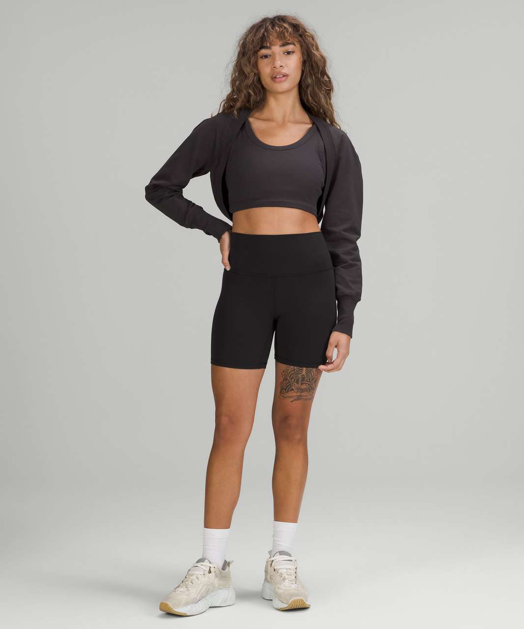 LA cropped long sleeve shrug in black granite+ white opal in size 6+ flow y  bra in size 8+ invigorate 23” size 4 in smoked spruce : r/lululemon