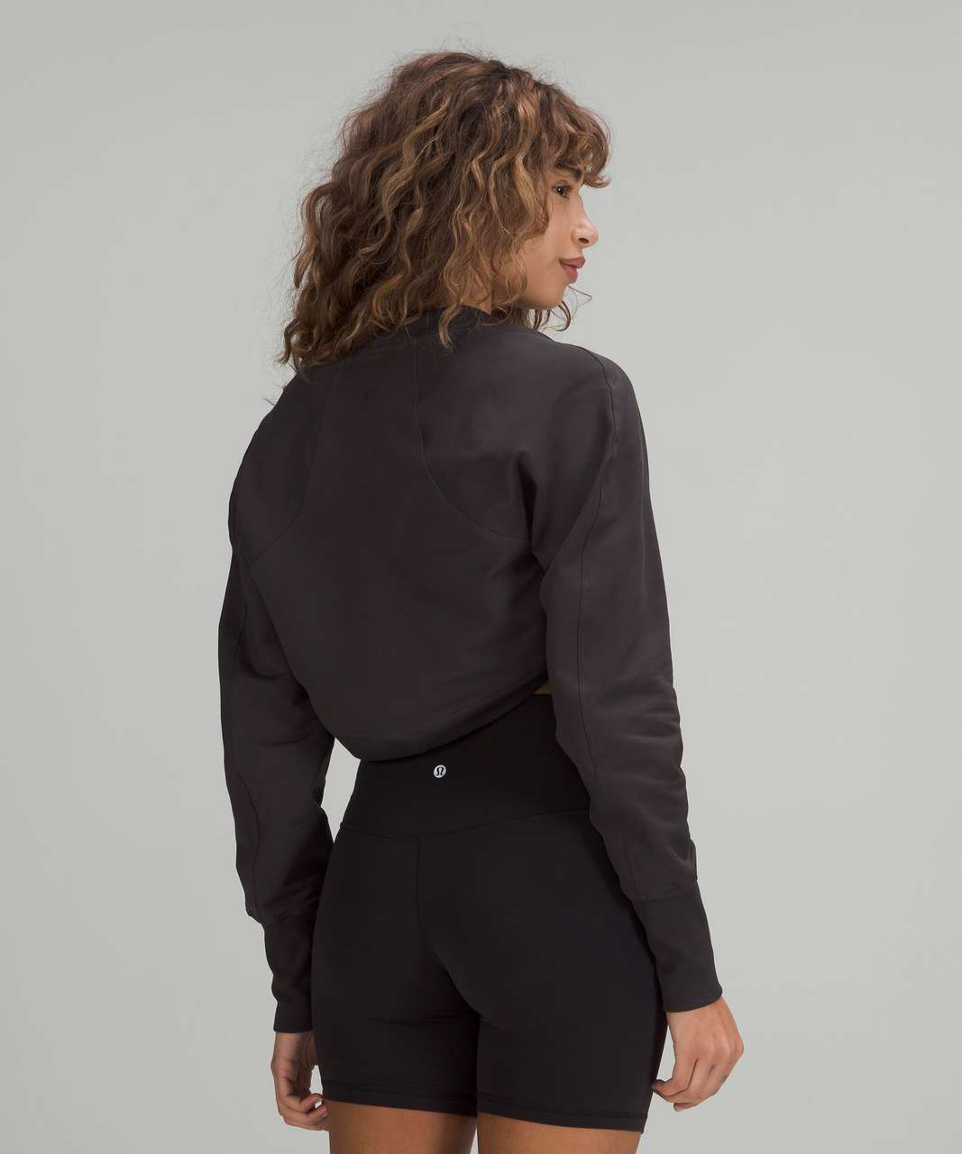 LA cropped long sleeve shrug in black granite+ white opal in size 6+ flow y  bra in size 8+ invigorate 23” size 4 in smoked spruce : r/lululemon