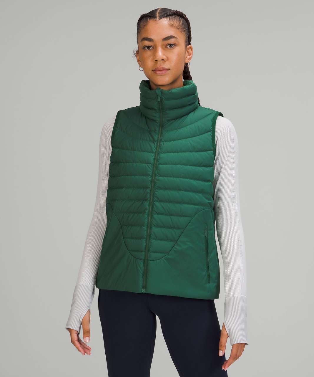 Everglade green half zip and down for it all vest coming in clutch